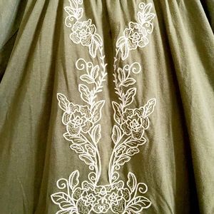 Olive green with cream colored embroidery, short sleeve. 100% cotton, Spotless